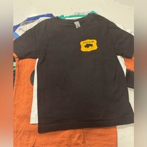 Next Level Freedom Apparel Black T-Shirt with Yellow Logo